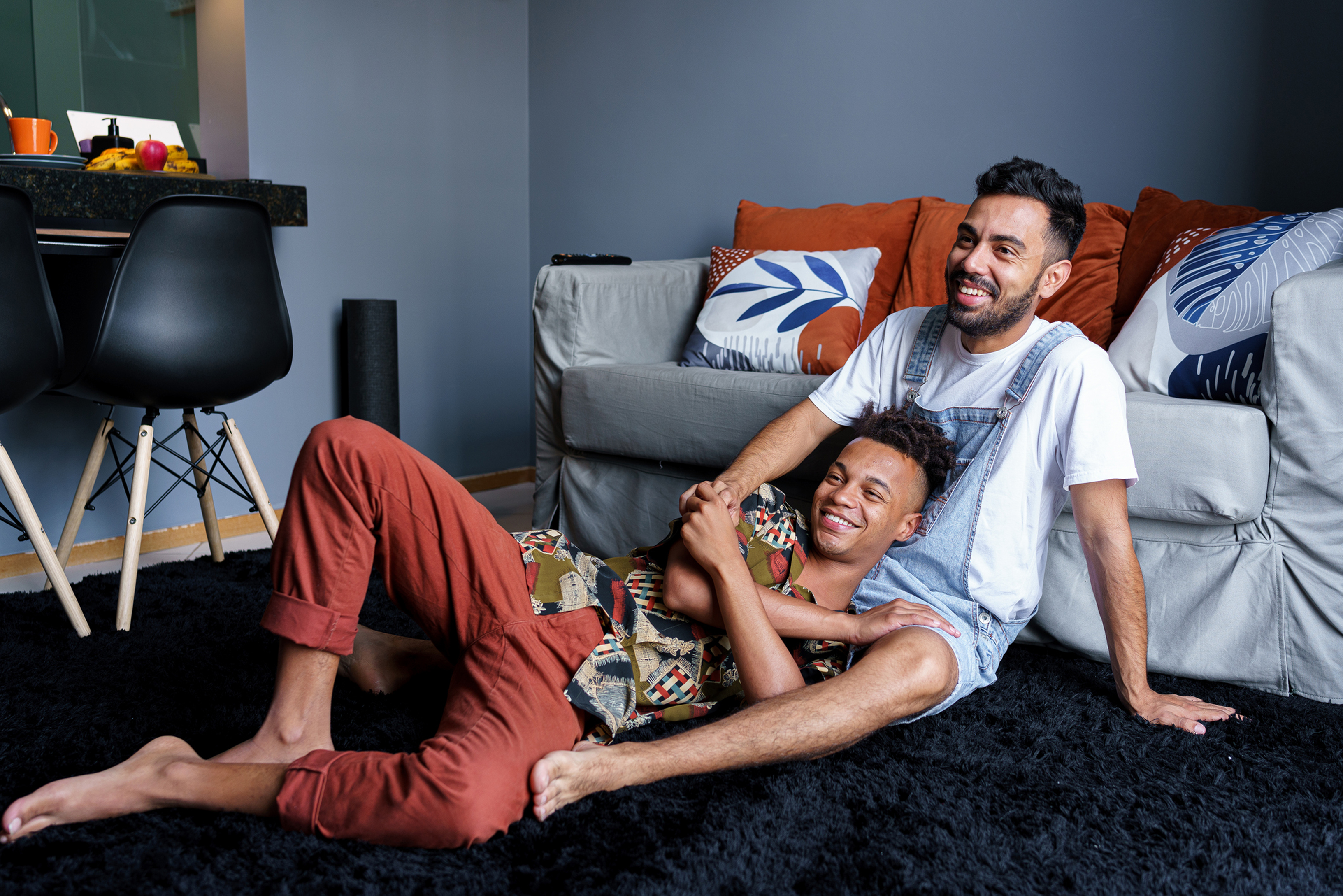 Smiling couple in bed