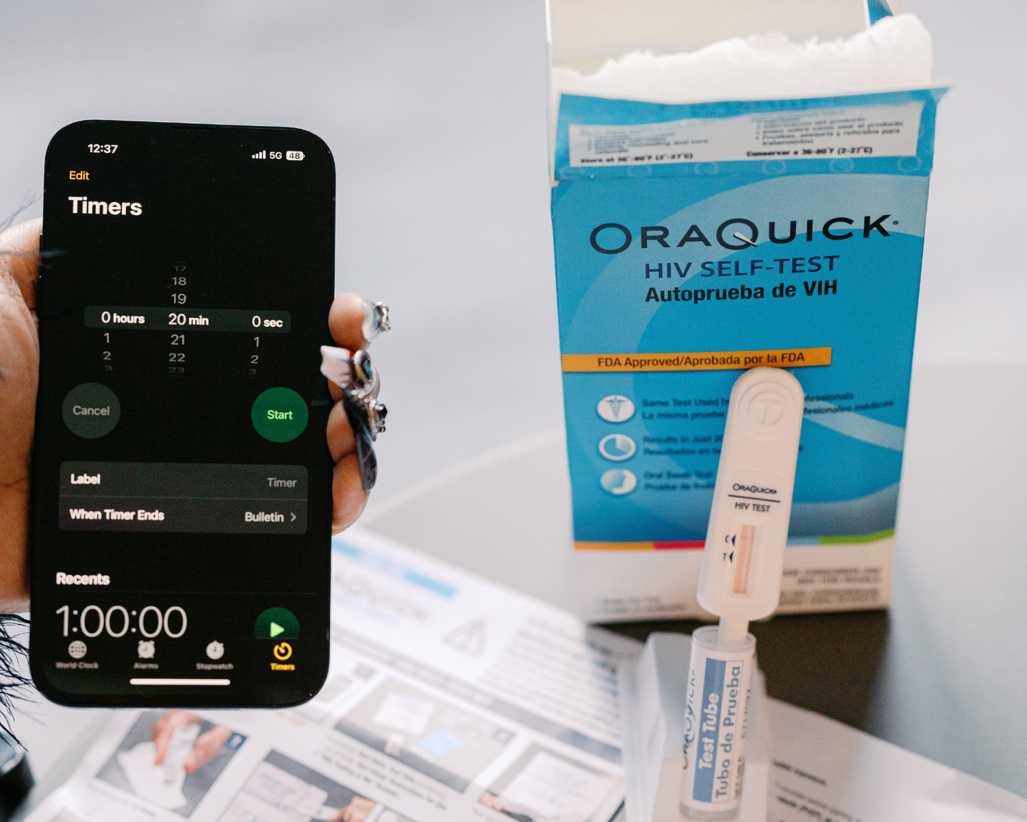 Phone timer next to Oraquick box